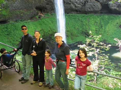 Who wouldn't be smiling to see such a spectacular waterfall